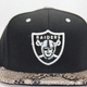 Don C Oakland Raiders cap
eBay screenshot